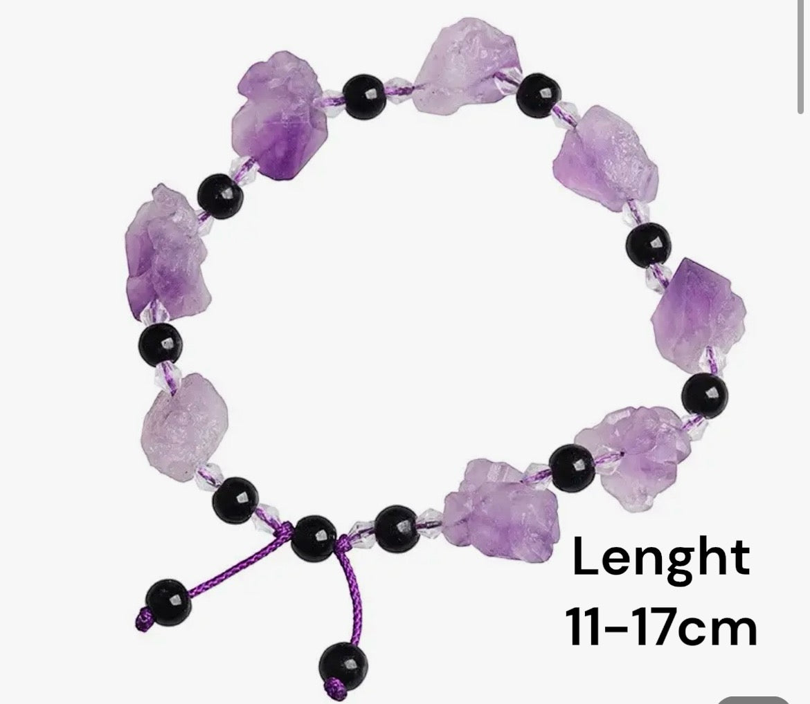 Natural Amethyst Stone Bracelet. A beautifully crafted bracelet featuring genuine amethyst stones, known for their calming and healing properties. A stylish accessory that adds a touch of elegance and tranquility to your look.