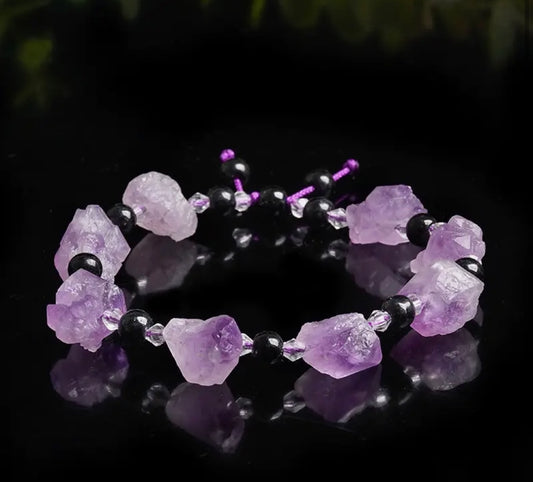 Natural Amethyst Stone Bracelet. A beautifully crafted bracelet featuring genuine amethyst stones, known for their calming and healing properties. A stylish accessory that adds a touch of elegance and tranquility to your look.